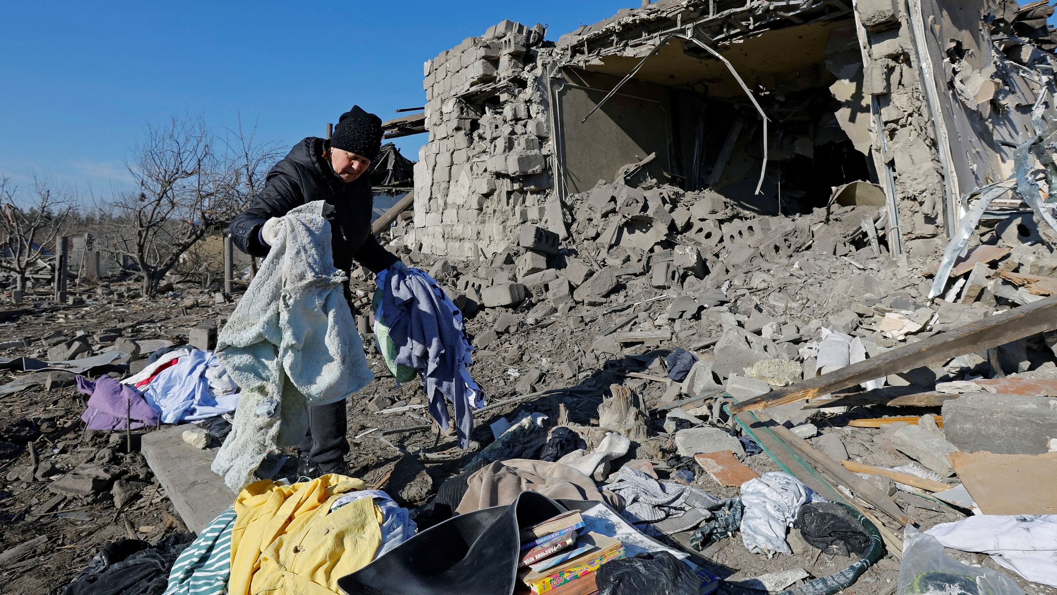 <div class="paragraphs"><p>A local resident collects belongings in the ruins of a destroyed house following what local Russian-installed authorities say was a Ukrainian military strike in the course of Russia-Ukraine conflict, on the outskirts of Makiivka (Makeyevka) in the Donetsk region, Russian-controlled Ukraine, March 12, 2024.</p></div>