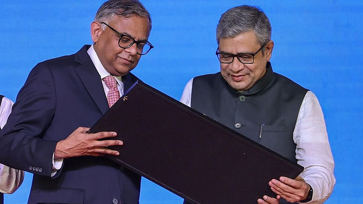 <div class="paragraphs"><p>Union Railways Minister Ashwini Vaishnaw and Tata Sons Chairman N Chandrasekaran during foundation stone laying of Tata-Powerchip Semiconductor Manufacturing Corp chip fabrication unit, in Dholera, Gujarat, Wednesday on March 13, 2024.</p></div>
