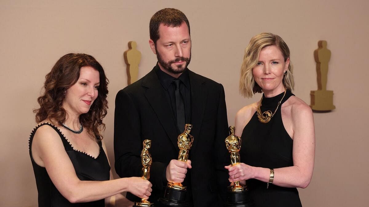 <div class="paragraphs"><p>Michelle Mizner and Raney Aronson - Rath pose with the Oscar for Best Documentary Feature Film for '20 Days in Mariupol' in the Oscars photo room at the 96th Academy awards in Hollywood, Los Angeles.</p></div>