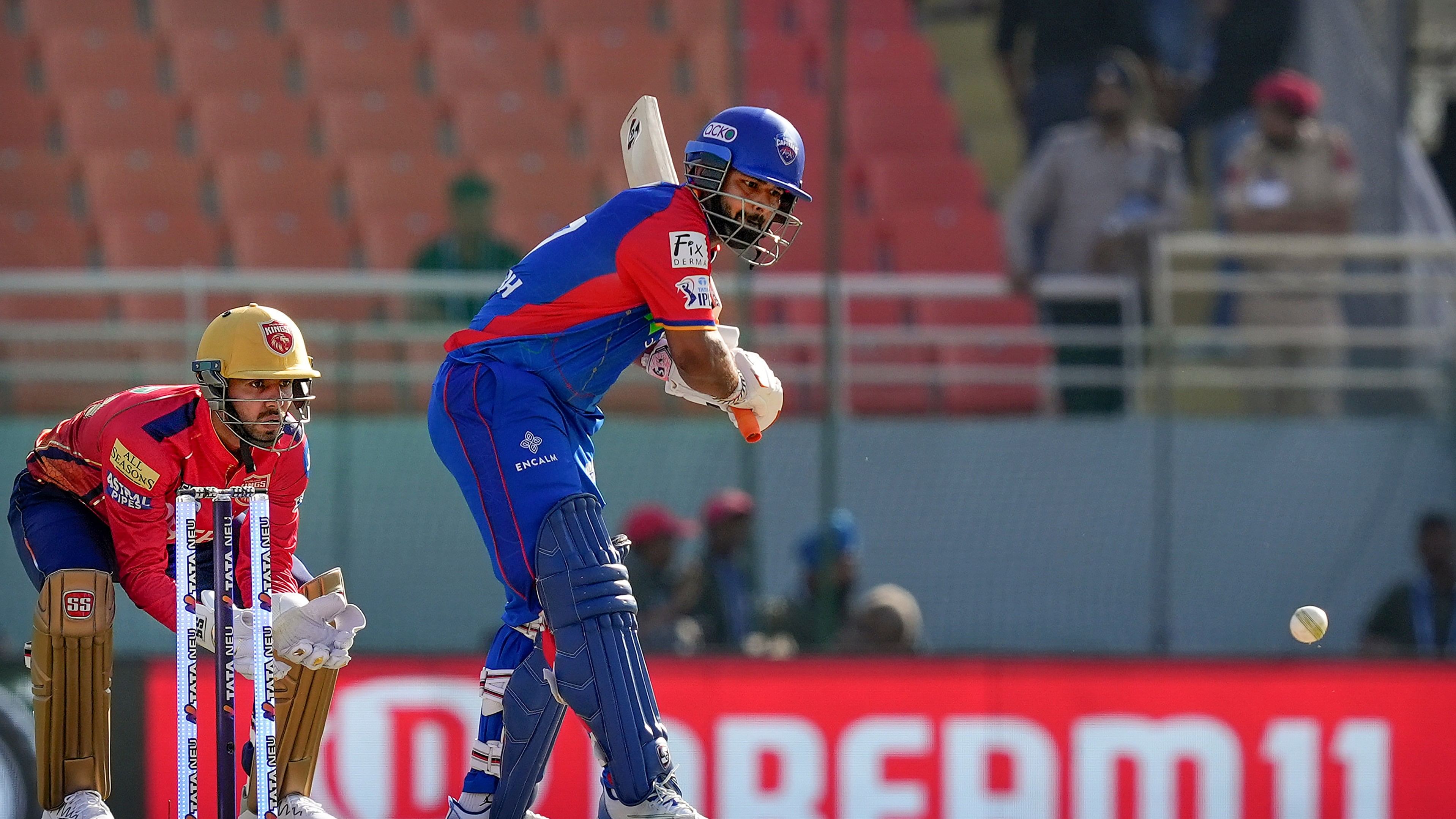 <div class="paragraphs"><p>Delhi Capitals captain Rishabh Pant plays a shot during the Indian Premier League (IPL) 2024 T20 cricket match between Delhi Capitals and Punjab Kings, at Maharaja Yadavindra Singh International Cricket Stadium, in Mohali, Saturday, March 23, 2024. </p></div>