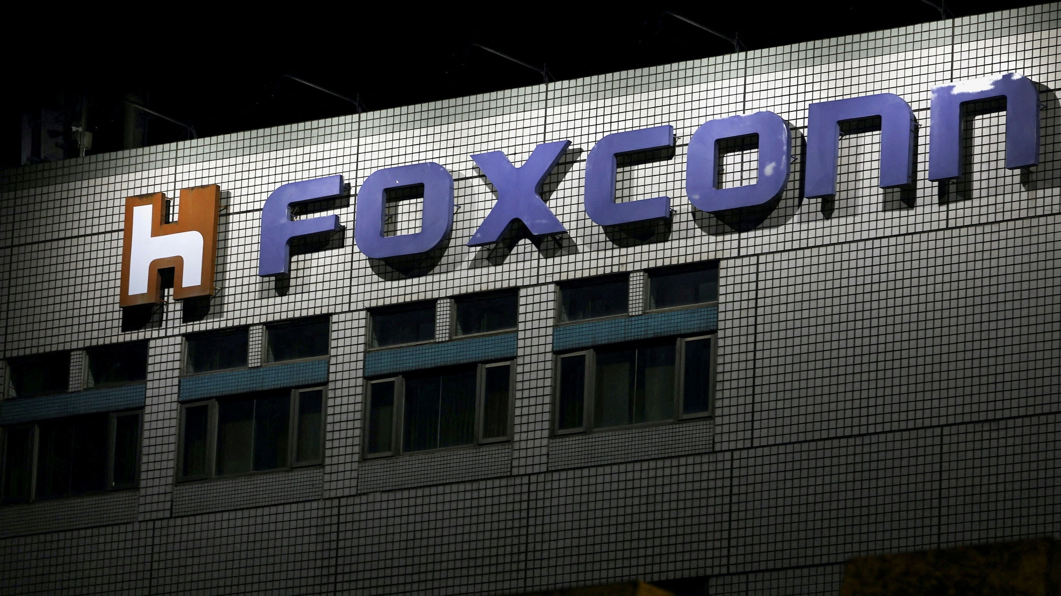 <div class="paragraphs"><p>Foxconn logo seen outside its manufacturing facility.</p></div>