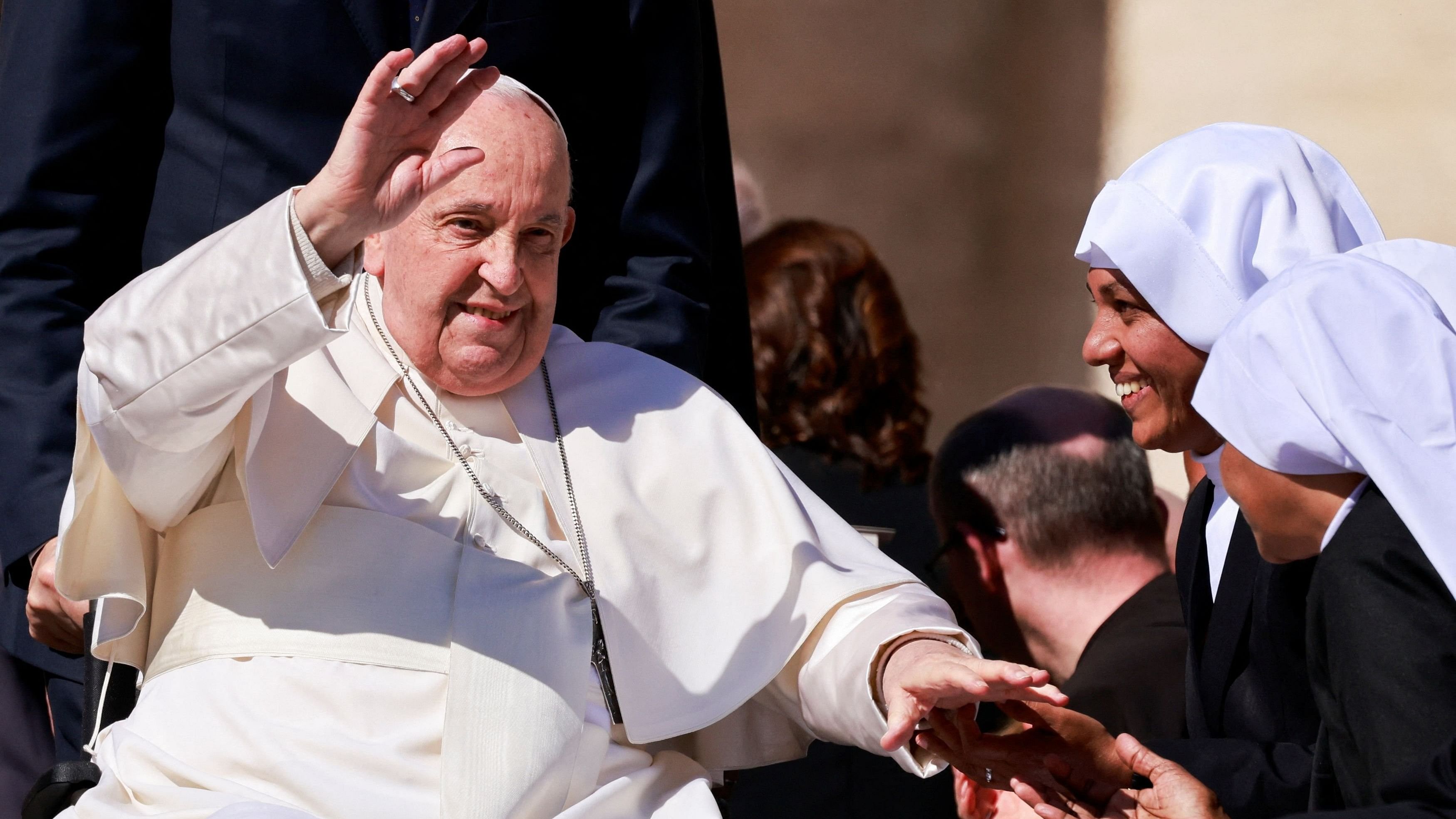 <div class="paragraphs"><p>Pope Francis greets people on the day of the weekly general audience in St. Peter's Square at the Vatican, March 20, 2024. </p></div>