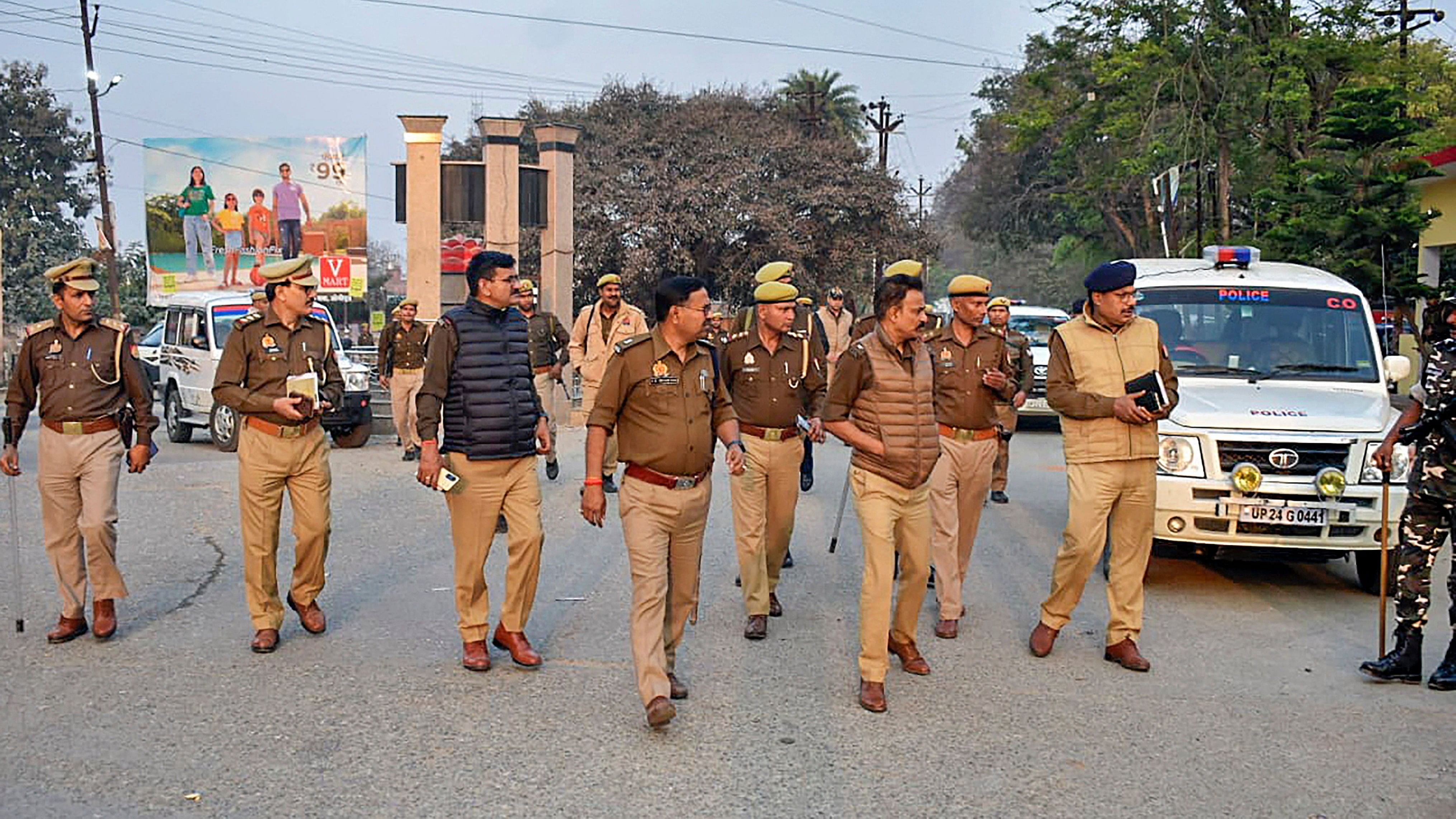 <div class="paragraphs"><p>Senior police officials visit the locality where a barber killed two boys on Tuesday, in Budaun district, Wednesday, March 20, 2024. </p></div>