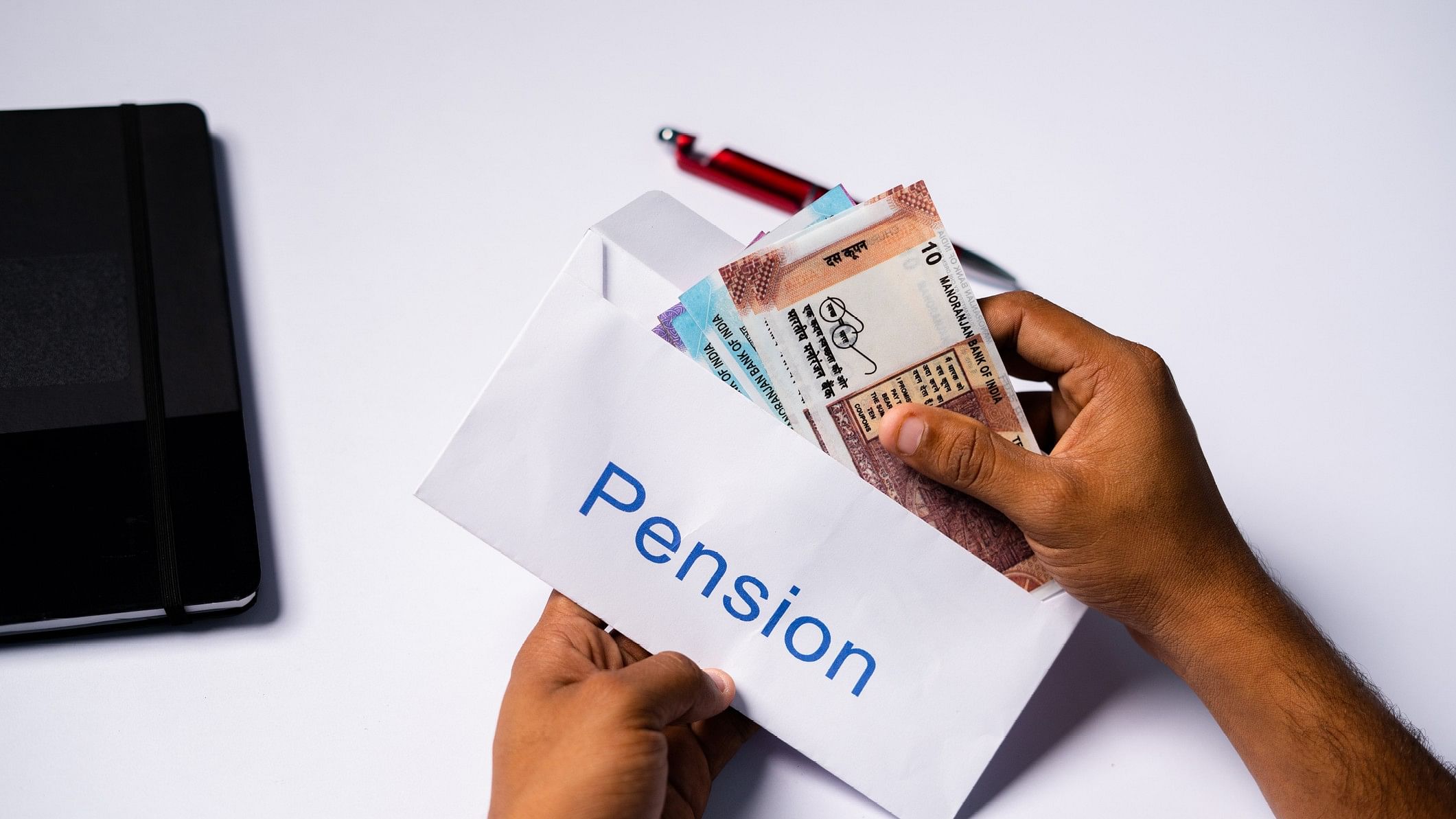 <div class="paragraphs"><p>Representative image of pension in an envelope.&nbsp;</p></div>
