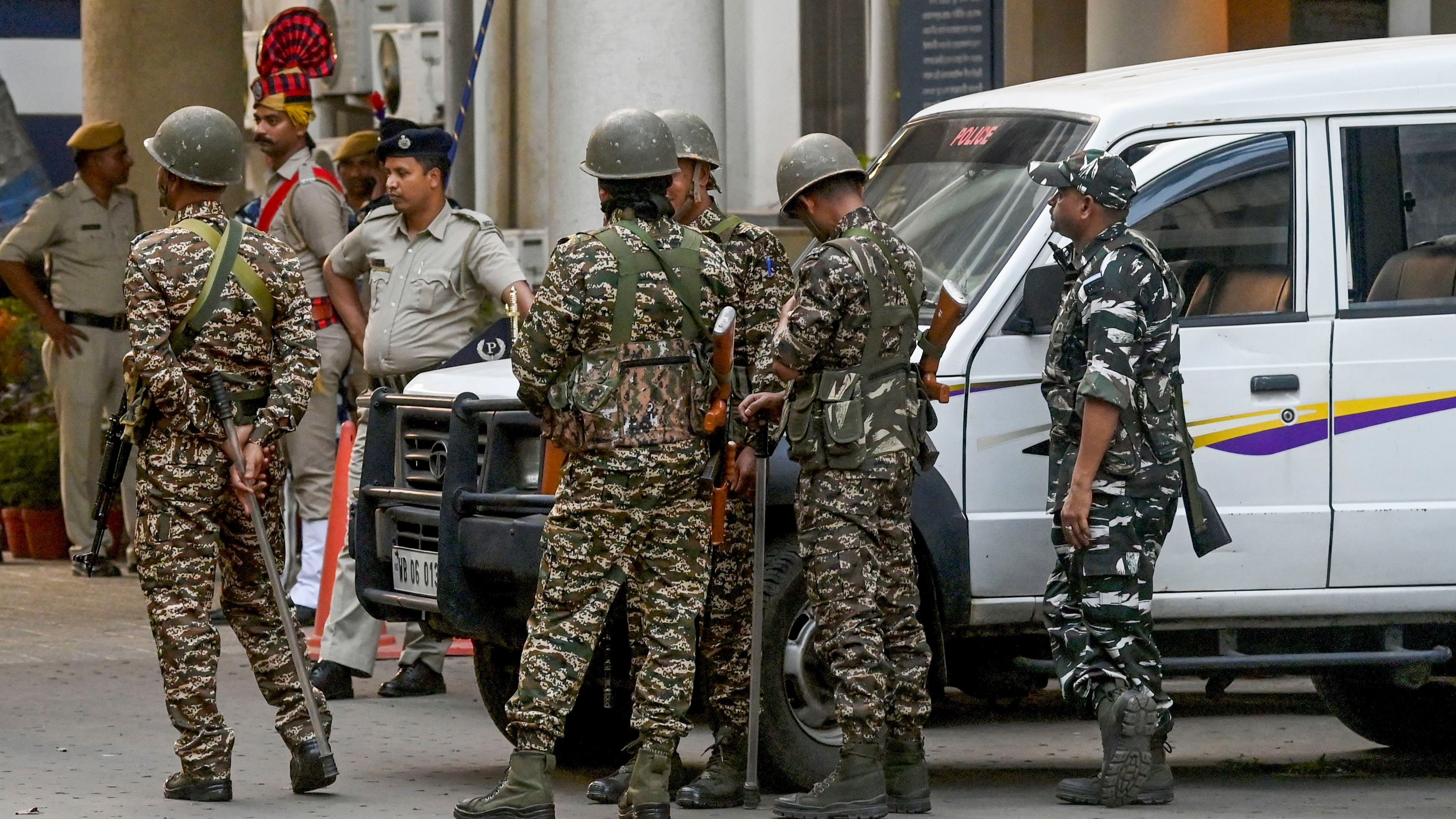 <div class="paragraphs"><p>Security personnel stand guard at Bhavani Bhawan (West Bengal Police headquarters) where CBI officials arrive to take Trinamool Congress leader Sheikh Shahjahan, accused in the Sandeshkhali case, but the officials had to leave without taking him, in Kolkata on Tuesday, March 5, 2024. </p></div>