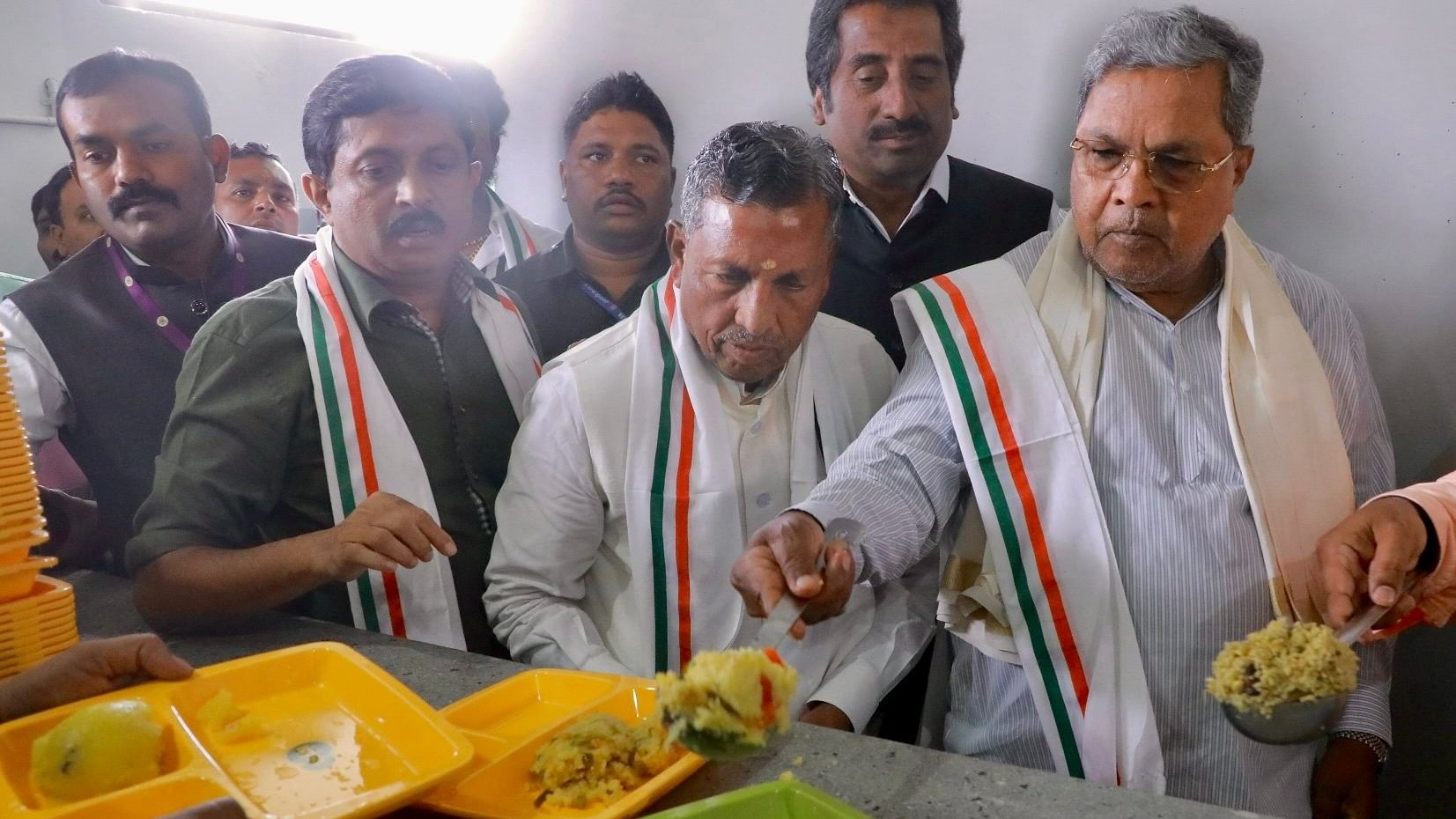<div class="paragraphs"><p>Chief Minister Siddaramaiah inaugurates the Indira Canteen, by serving upma, at the P7 parking area of the Kempegowda International Airport on Monday. </p></div>