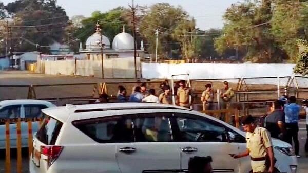 <div class="paragraphs"><p>Security personnel stand guard outside Bhojshala/Kamal Maula Mosque complex after a team of the ASI reached the complex for a survey, in Dhar, Friday, March 22, 2024.</p></div>