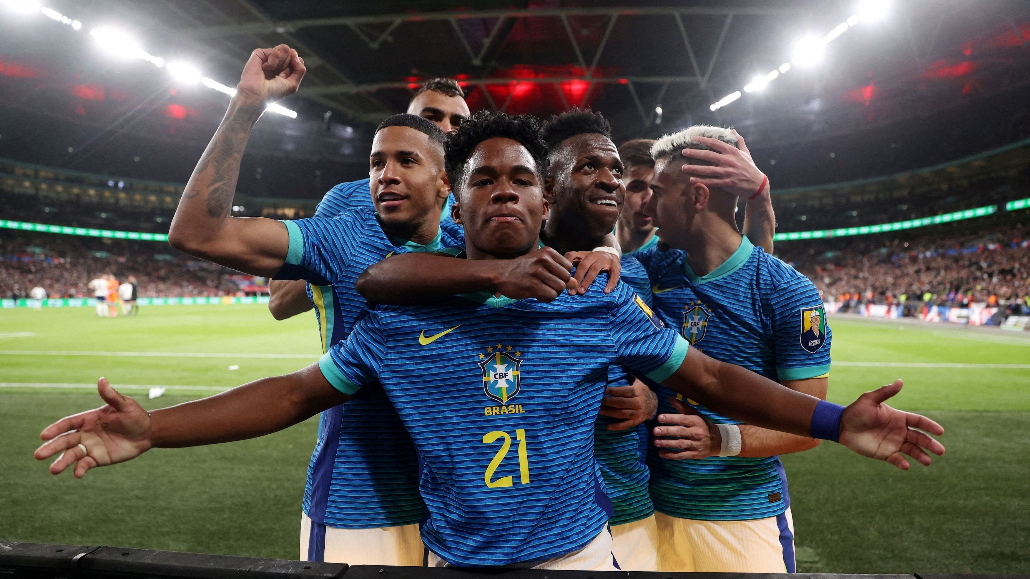 <div class="paragraphs"><p>Brazil's Endrick celebrates scoring their first goal with Vinicius Junior and teammates</p></div>