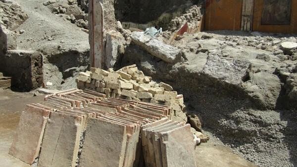 <div class="paragraphs"><p>Evidences of a construction site has resurfaced in the rooms of an ancient domus during archaeological excavation in Pompeii.&nbsp;The archaeologists found working tools, stacked roof tiles, tuff bricks, and heaps of lime and stones used to create walls.</p></div>