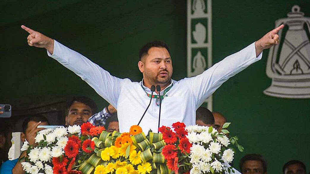 <div class="paragraphs"><p>RJD leader Tejashwi Yadav addresses during 'Jan Vishwas Rally', in Patna</p></div>