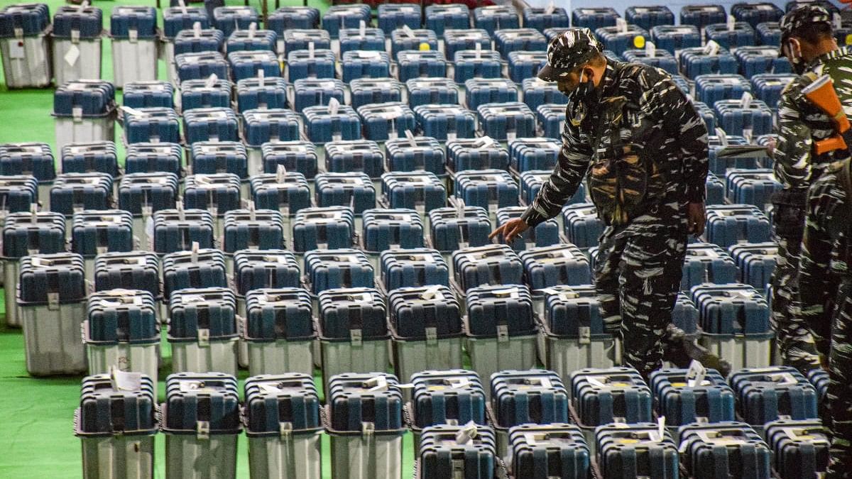 <div class="paragraphs"><p>Representative image showing security personnel check the Electronic Voting Machines in Punjab.</p></div>