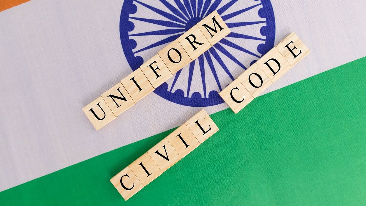 <div class="paragraphs"><p>Representative illustration showing the Indian flag and the words 'Uniform Civil Code'.</p></div>