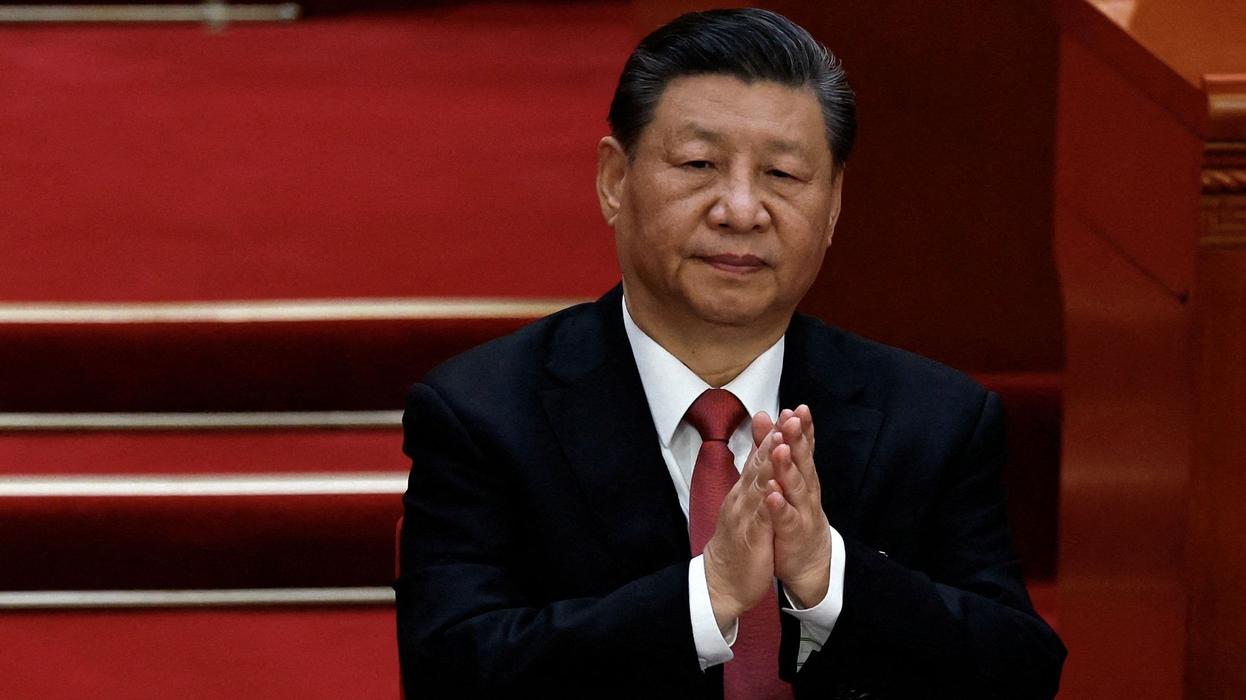 <div class="paragraphs"><p>Chinese President Xi Jinping applauds at the closing session of the National People's Congress  at the Great Hall of the People in Beijing, China March 11, 2024. </p></div>