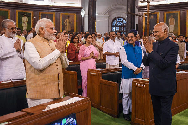 <div class="paragraphs"><p>Former president Ram Nath Kovind greets Prime Minister Narendra Modi in this file photo.</p></div>