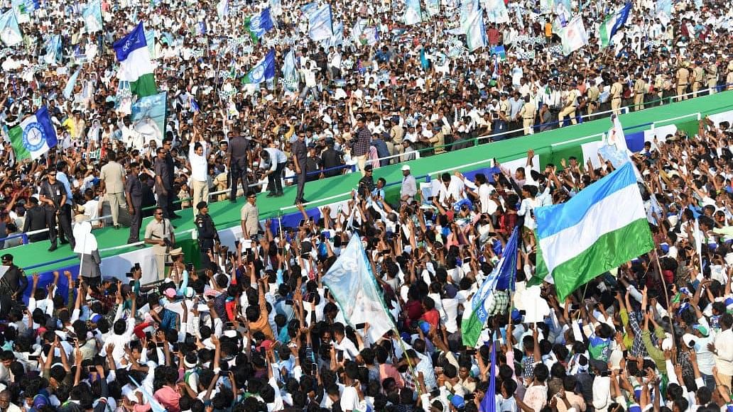 <div class="paragraphs"><p>YS Jagan greets party workers while walking on the special ramp arranged at Sidham meeting in Meradametla in Bapatla district of Andhra Pradesh on Sunday.</p></div>