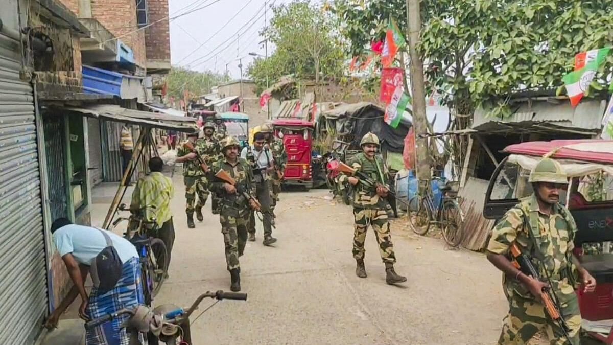 <div class="paragraphs"><p>Security personnel conduct a route march, at West Bengal's Sandeshkhali. (Representative image)</p></div>