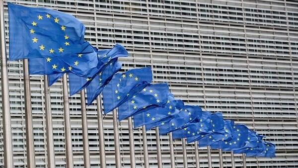 <div class="paragraphs"><p>European Union flags flutter outside the EU Commission headquarters in Brussels, Belgium.</p></div>