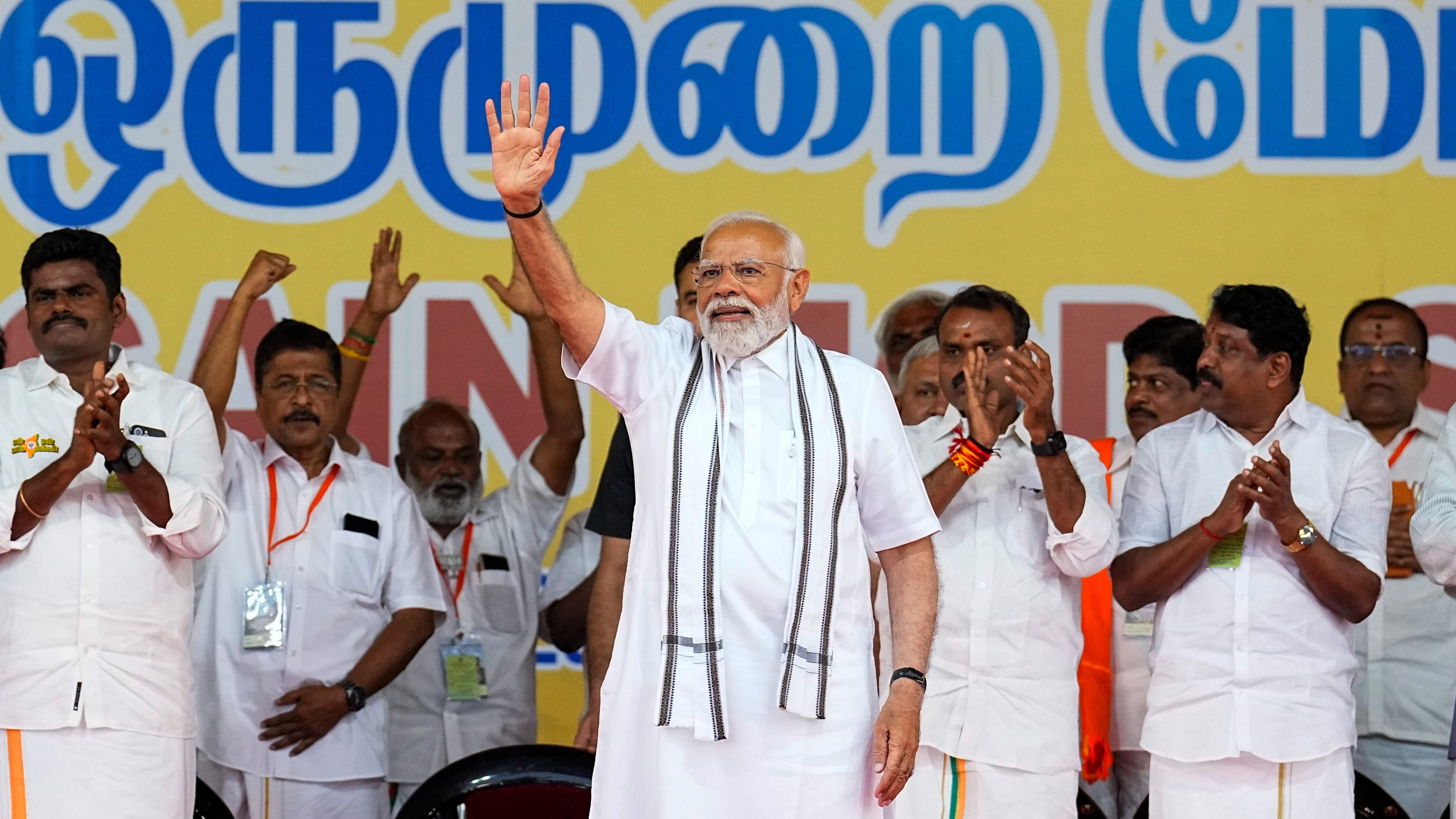 <div class="paragraphs"><p>Prime Minister Narendra Modi waves at supporters during a public meeting ahead of the Lok Sabha elections, at Nandanam YMCA Ground in Chennai, on Monday.</p></div>