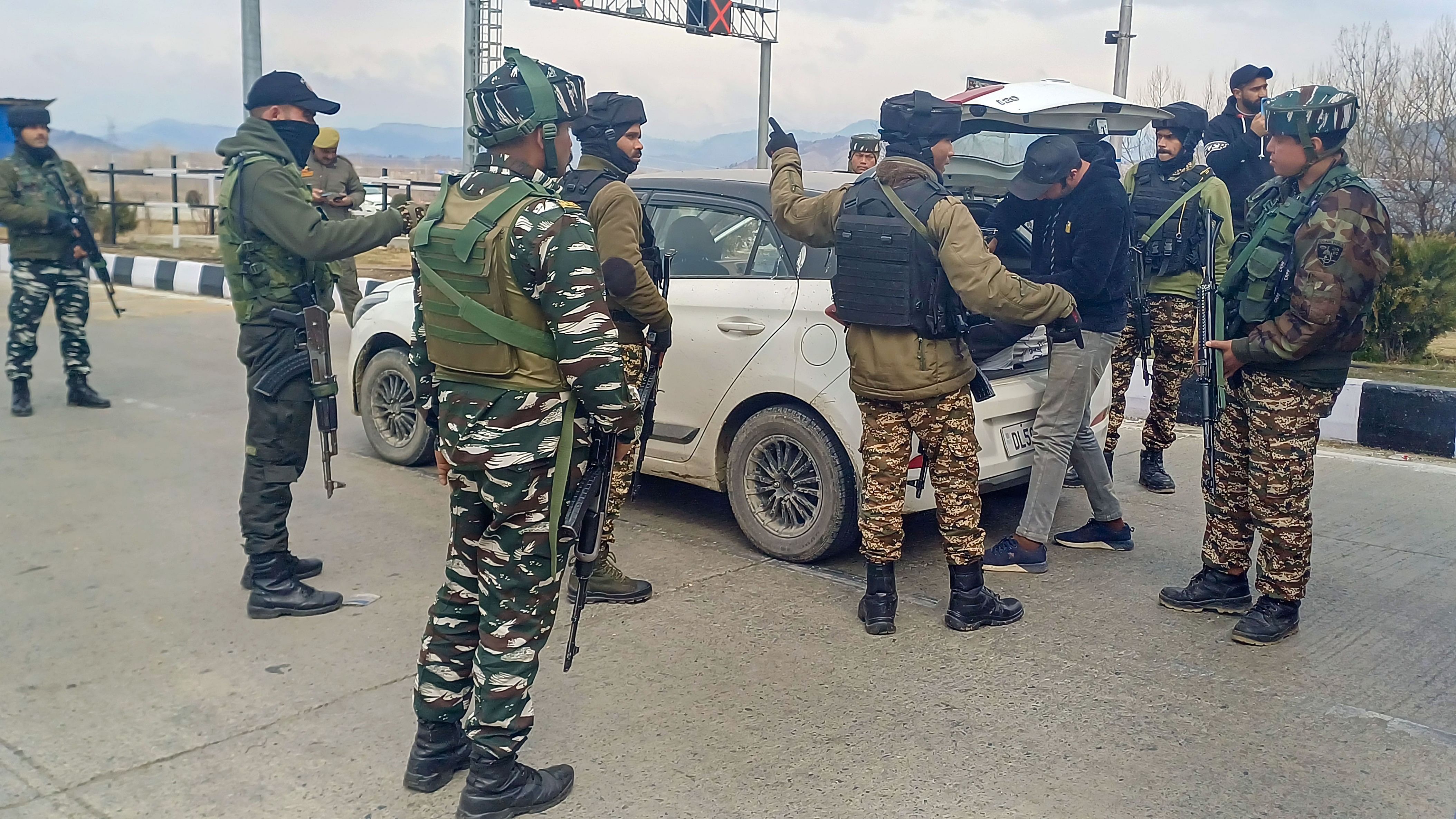 <div class="paragraphs"><p>Security personnel check vehicles ahead of Prime Minister Narendra Modi's visit, in Srinagar.</p></div>