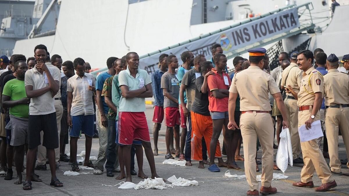 <div class="paragraphs"><p>Pirates, apprehended in an operation off the coast of Somalia by the Indian Navy, being handed over to the Mumbai Police after the arrival of Warship INS Kolkata, in Mumbai, Saturday on March 23, 2024.</p></div>