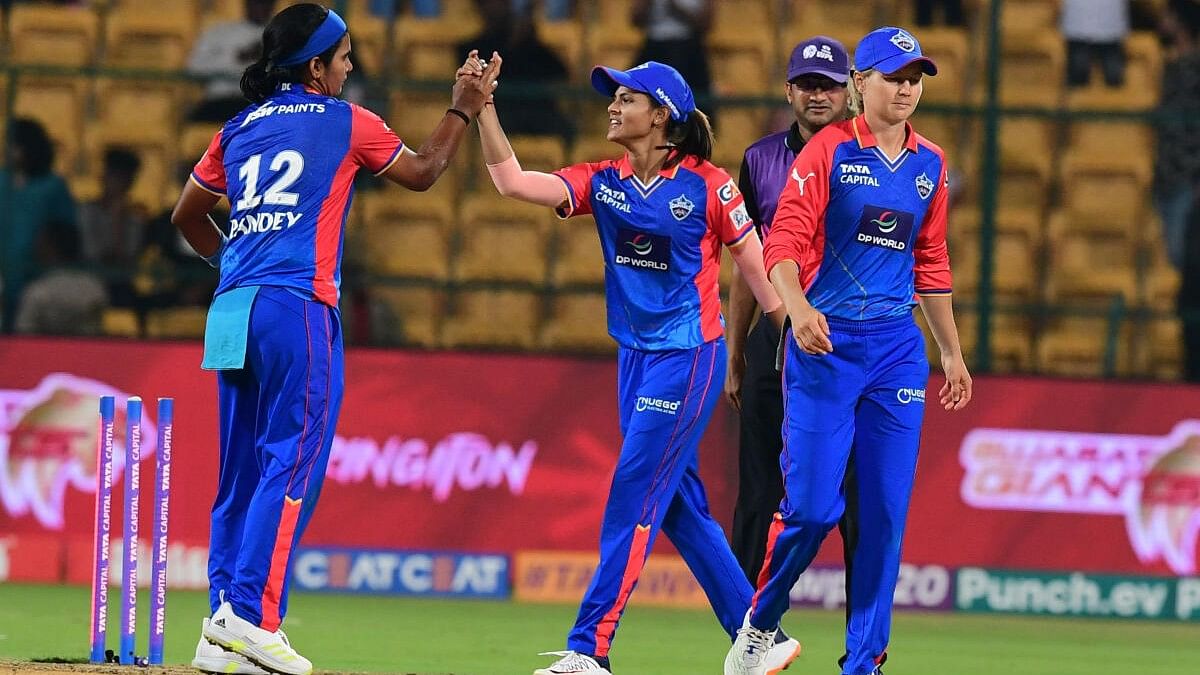 <div class="paragraphs"><p>Delhi Capitals players celebrate after won against Gujarat Giants in Gujarat Giants vs Delhi Capitals Women Premier League (WPL) Cricket match at M Chinnaswamy Stadium in Bengaluru.&nbsp;</p></div>