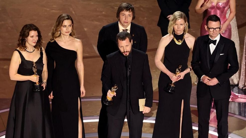 <div class="paragraphs"><p>Director Mstyslav Chernov and producers Michelle Mizner and Raney Aronson-Rath win the Oscar for Best Documentary Feature Film for "20 Days in Mariupol" during the Oscars show at the 96th Academy Awards in Hollywood, Los Angeles.</p></div>