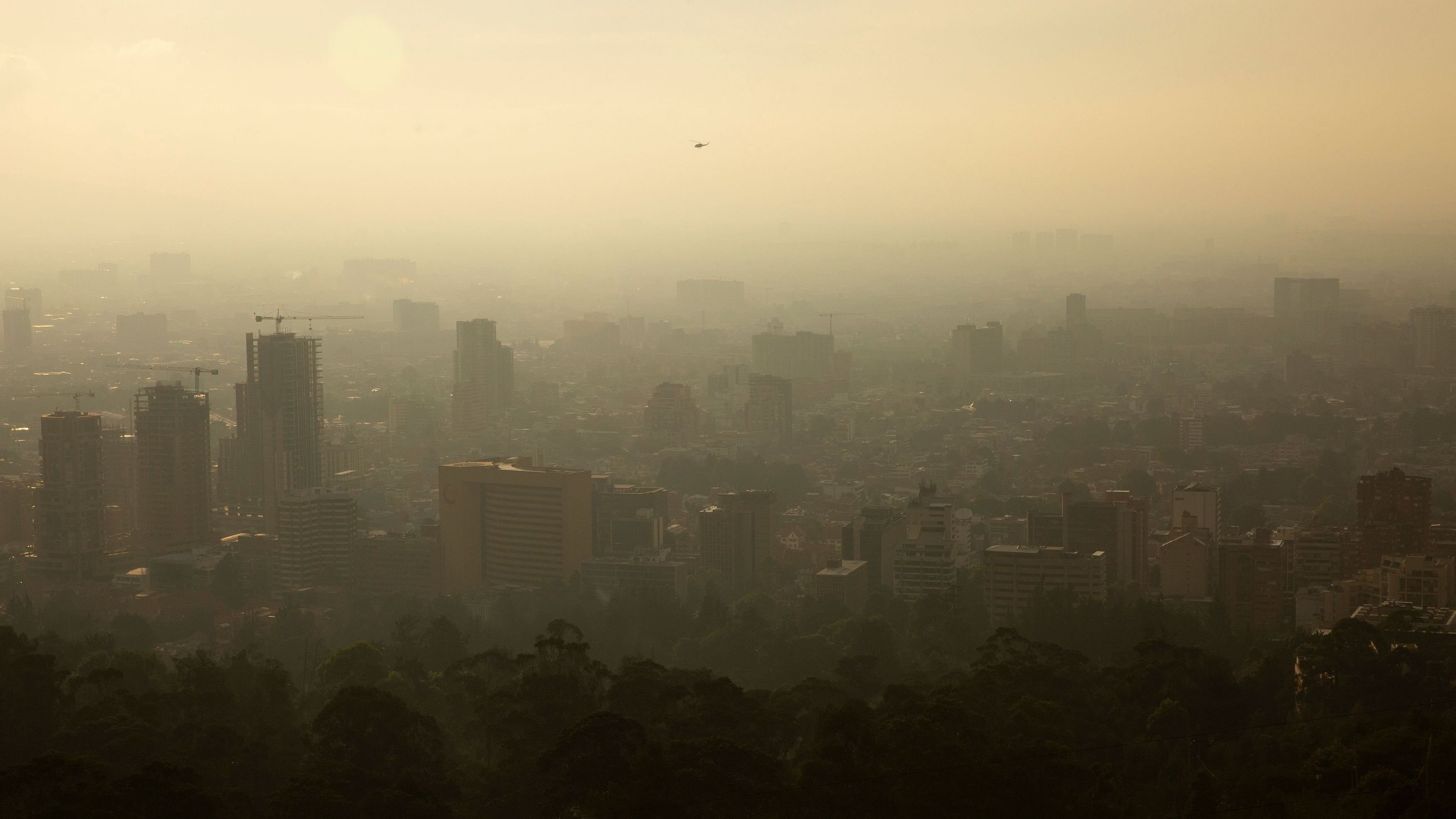 <div class="paragraphs"><p>General view of the city as forest fires burn on a hill, after the district government declared an air quality emergency, in Bogota, Colombia, earlier this year.</p></div>