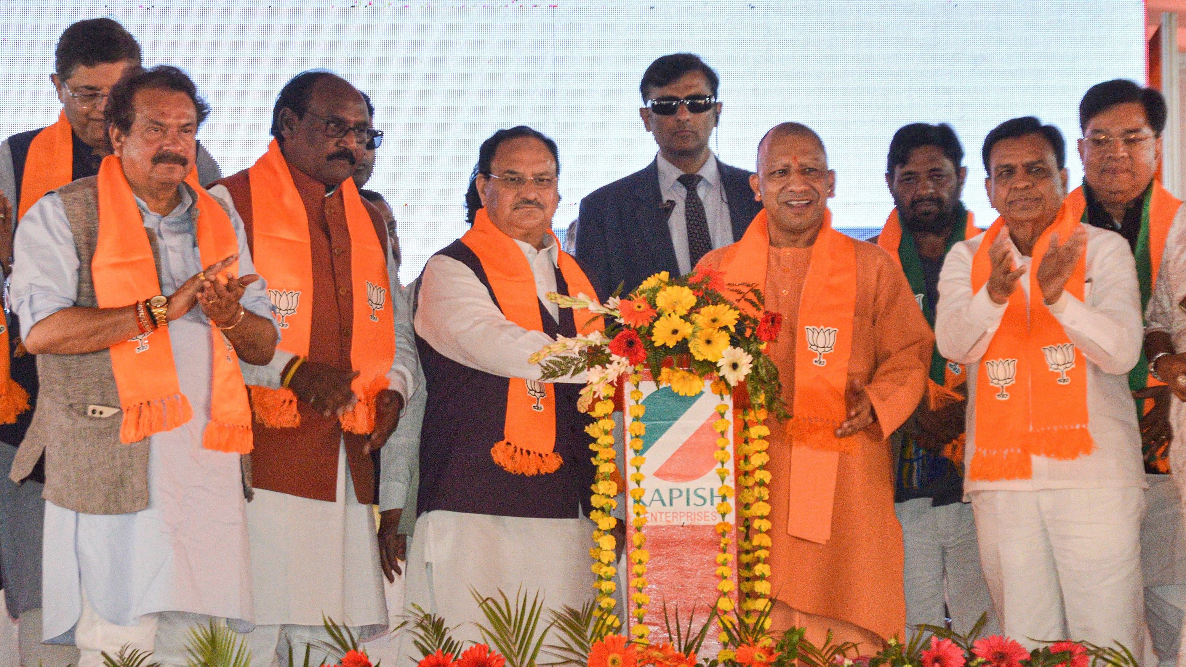 <div class="paragraphs"><p>Uttar Pradesh Chief Minister Yogi Adityanath with BJP National President JP Nadda and others during the 'Scheduled Caste Mahasammelan' organised by BJP Scheduled Caste Morcha, in Agra district, Thursday, March 7, 2024.</p></div>