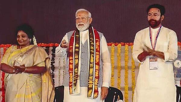 <div class="paragraphs"><p>Prime Minister Narendra Modi with Tenalgana Governor Tamilisai Soundararajan and Union Minister G Kishan Reddy during inauguration and foundation stone laying of multiple developmental projects, in Sangareddy, Tuesday, March 5, 2024.</p></div>