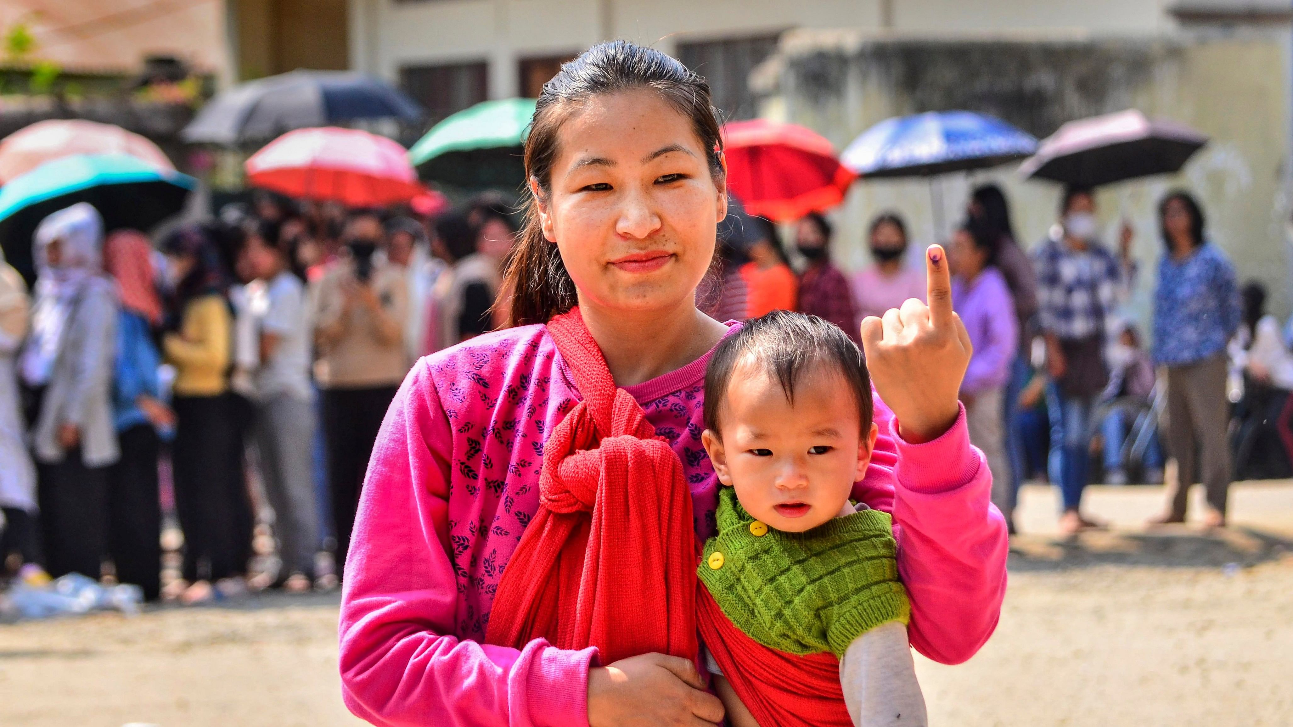 <div class="paragraphs"><p>File Photo: A woman casts her vote at a polling station in Dimapur.</p></div>