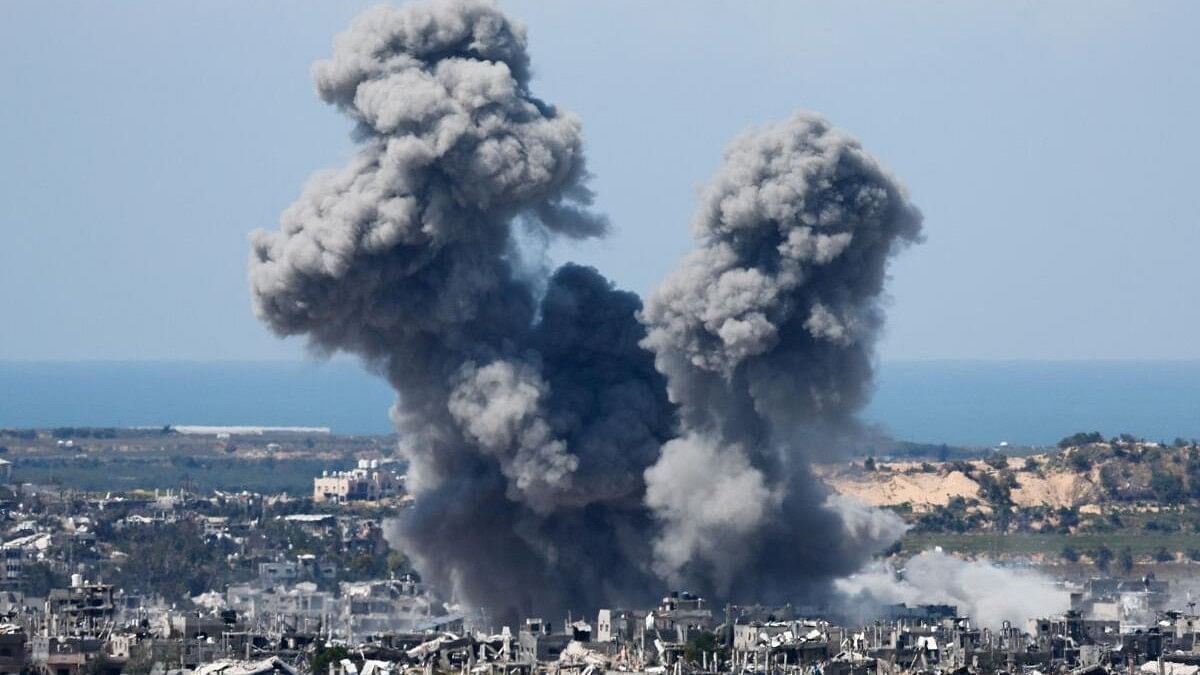 <div class="paragraphs"><p>Smoke rises from Gaza during an explosion following an airstrike, amid the ongoing conflict between Israel and Palestinian Islamist group Hamas, as seen from Israel, March 23, 2024. </p></div>