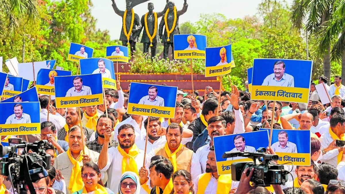 <div class="paragraphs"><p>AAP workers and supporters at Shaheedi Park during a protest over the arrest of Delhi Chief Minister Arvind Kejriwal in connection with an excise policy-linked money-laundering case, in New Delhi, Saturday.</p></div>