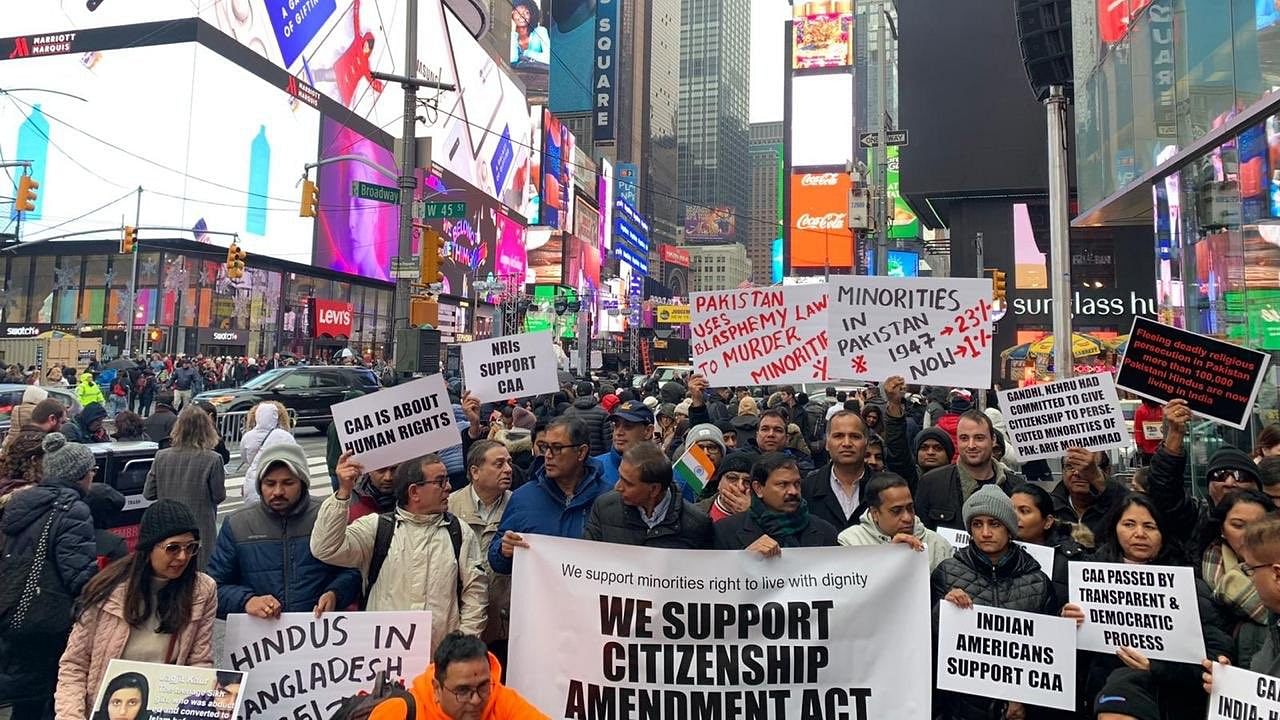 <div class="paragraphs"><p>A group of Indian-Americans gathered at Times Square, carrying placards and raising slogans in support of CAA.</p></div>