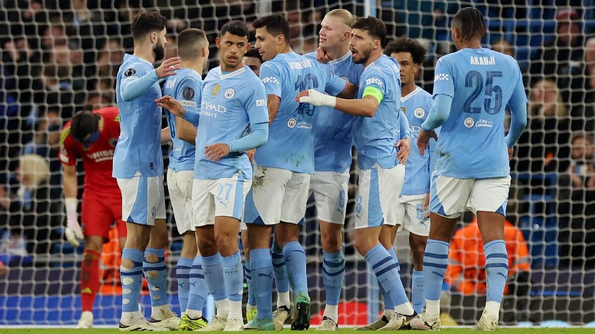 <div class="paragraphs"><p>Manchester City's Erling Braut Haaland celebrates scoring their third goal with teammates</p></div>