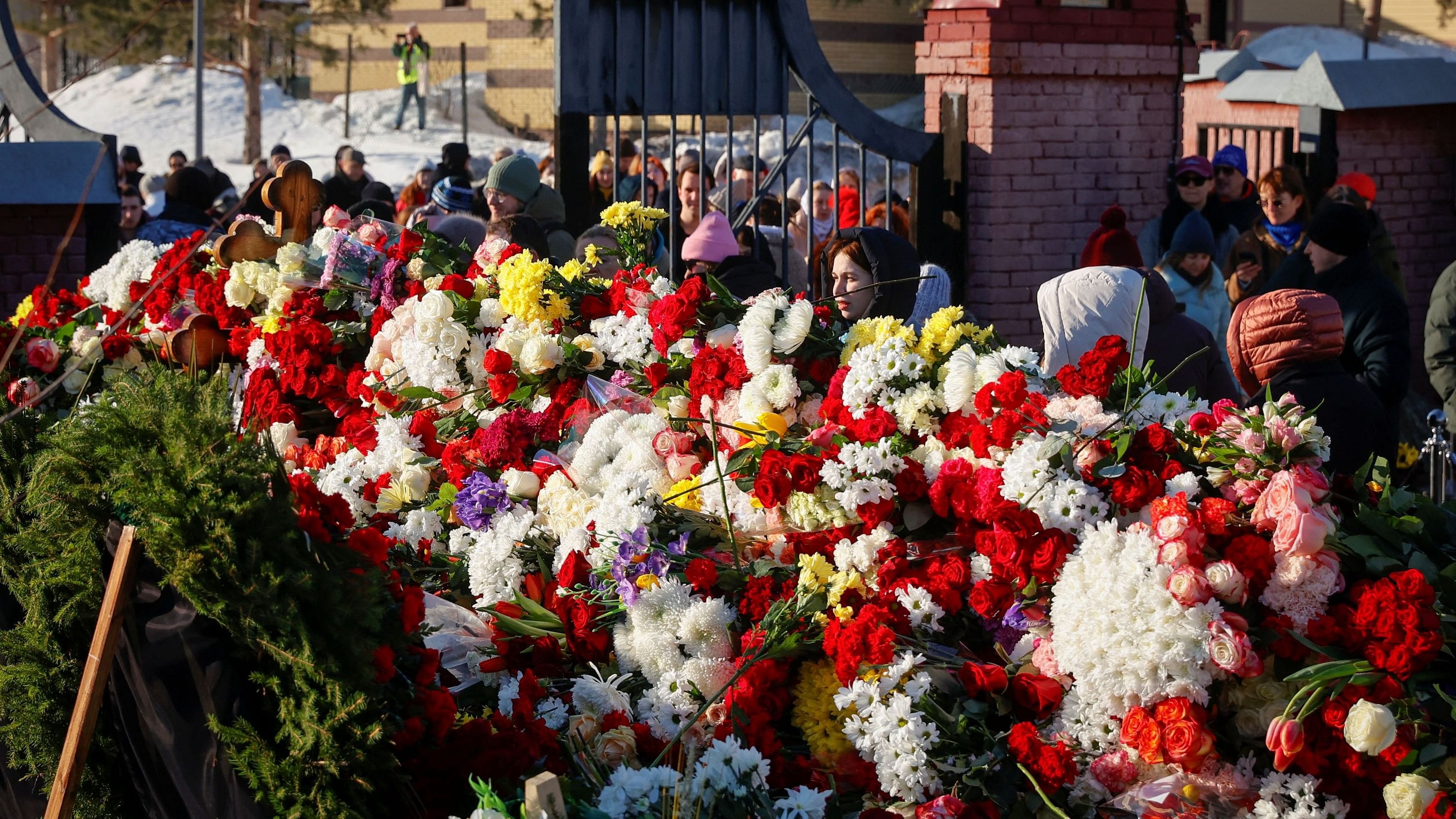 <div class="paragraphs"><p>People at the grave of Russian opposition politician Alexei Navalny at the Borisovskoye cemetery, in Moscow, Russia, March 3, 2024. REUTERS/Stringer</p></div>