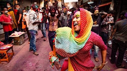 <div class="paragraphs"><p>A trans person enjoying Holi in Dhaka, Bangladesh.</p></div>