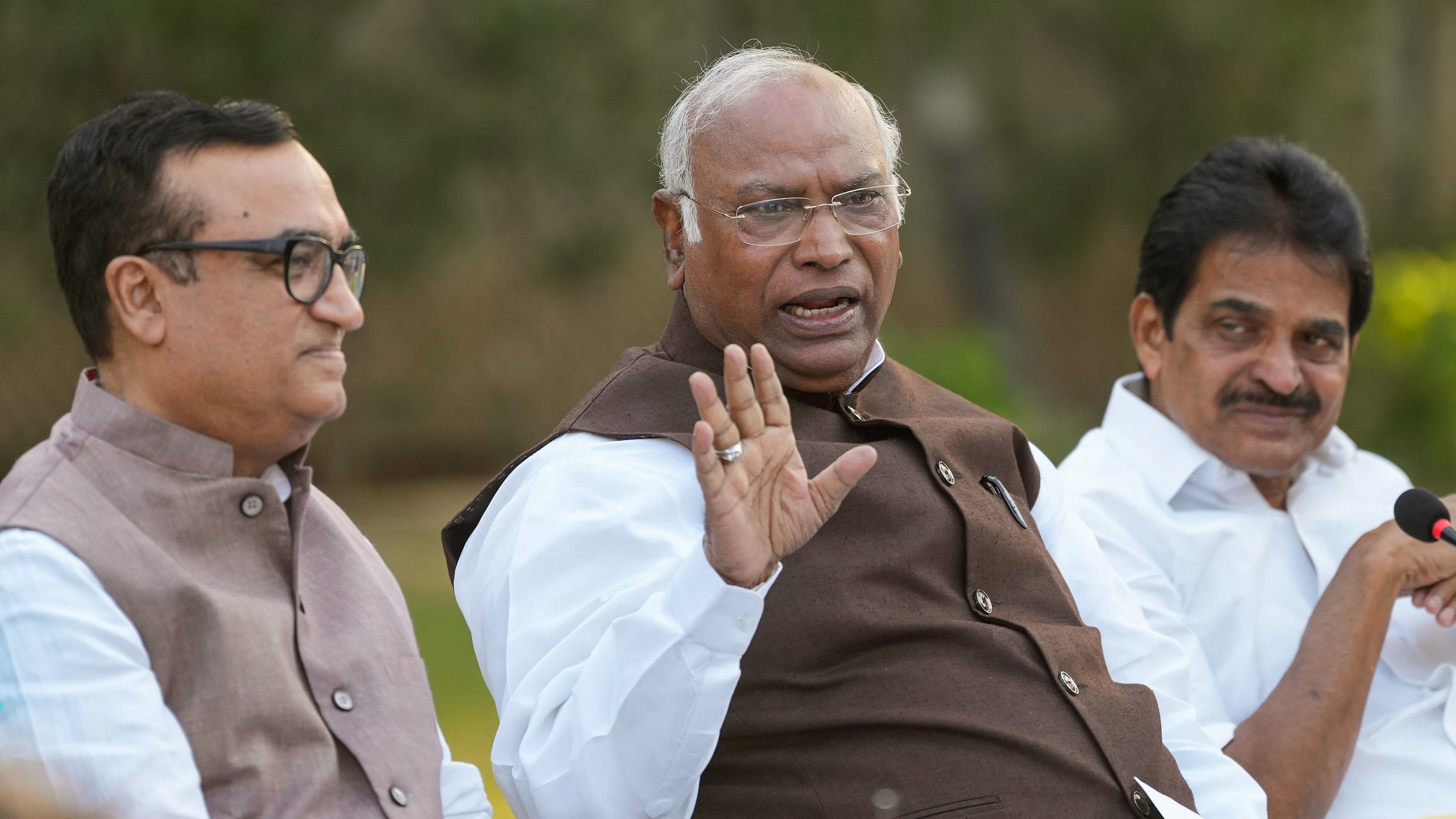 <div class="paragraphs"><p>Congress President Mallikarjun Kharge with party leaders Ajay Maken and K C Venugopal </p></div>