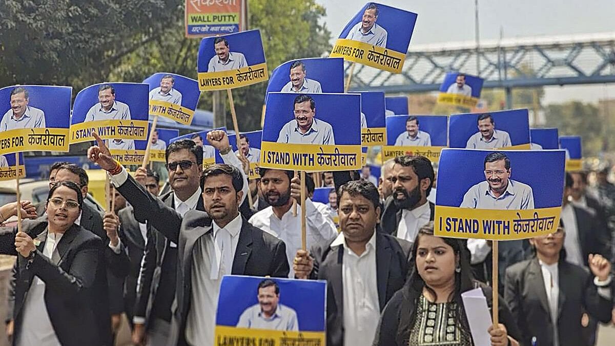 <div class="paragraphs"><p>AAP's legal cell members protest against the arrest of Delhi Chief Minister Arvind Kejriwal, outside the Tis Hazari Court in New Delhi.</p></div>