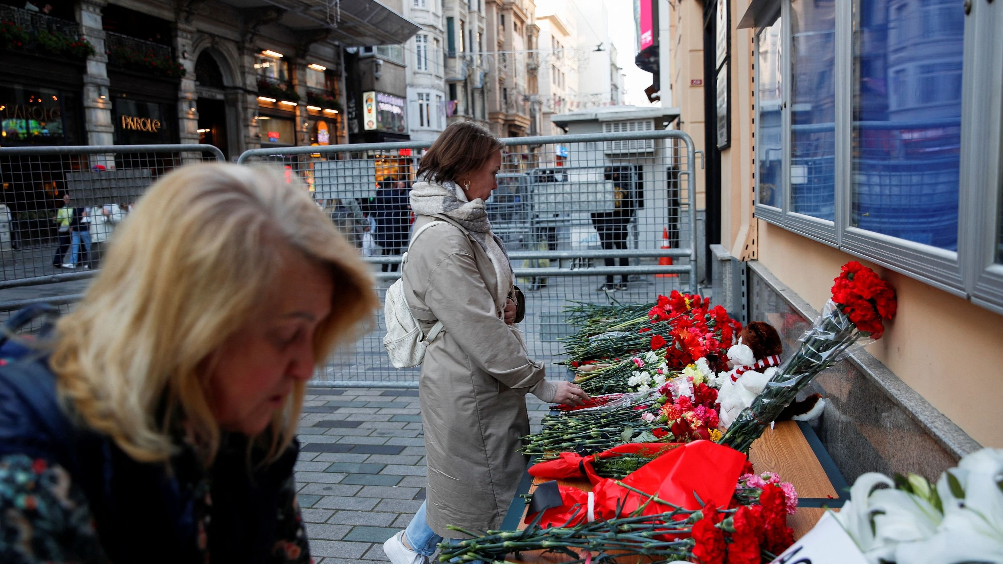 <div class="paragraphs"><p>Russian women living in Turkey lay flowers in front of the Russian consulate in memory of the victims of a deadly shooting attack at the Crocus City Hall concert venue outside Moscow, in Istanbul.</p></div>