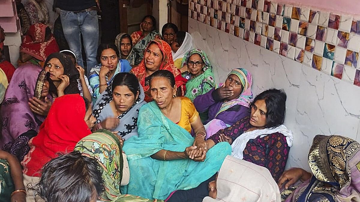 <div class="paragraphs"><p>Family members and relatives mourn after two boys were killed by a local barber on Tuesday, in Budaun, Wednesday, March 20, 2024. The accused was gunned down in an encounter hours later, according to officials.</p></div>