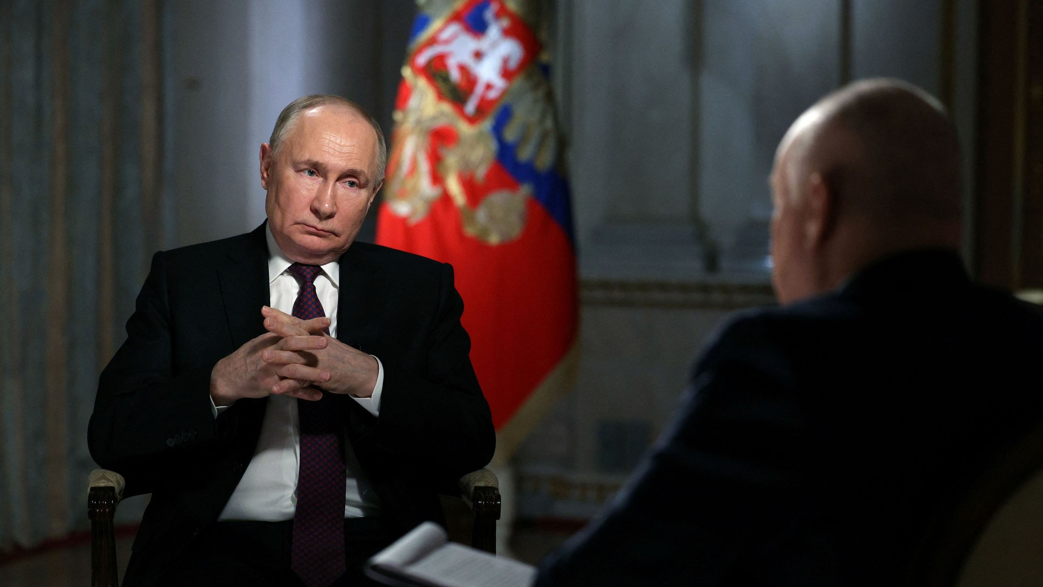 <div class="paragraphs"><p>esident Vladimir Putin speaks with Director General of Rossiya Segodnya media group Dmitry Kiselyov during an interview in Moscow, Russia, om March 12</p></div>