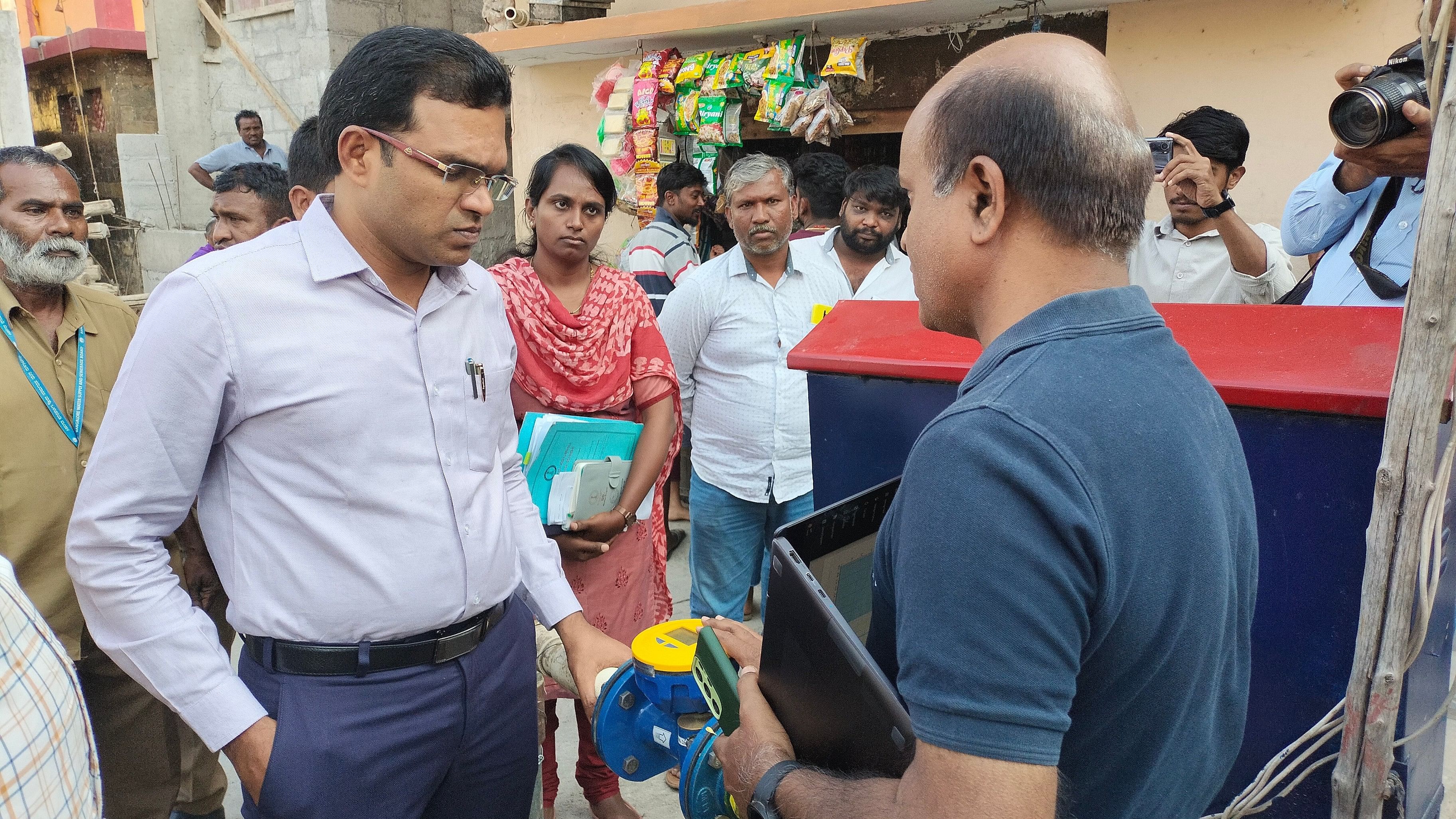 <div class="paragraphs"><p>BWSSB chairman Ramprasat Manohar V at the demonstration of the AI-based borewell monitoring system&nbsp;at Gangabhavani Badavane at Chinnappa Garden on Monday. </p></div>