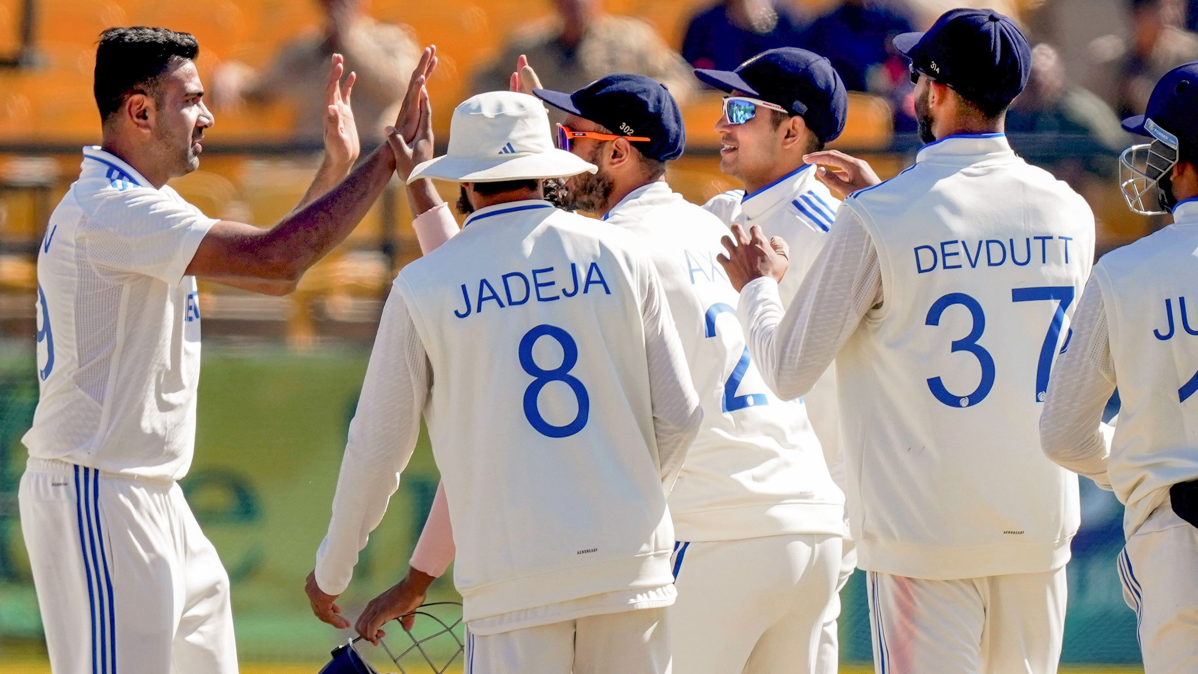 <div class="paragraphs"><p>Ravichandran Ashwin with teammates celebrates the wicket of England's Zak Crawley during the 3rd day of the fifth Test cricket match between India and England, in Dharamsala, Satutday, March 9, 2024. </p></div>