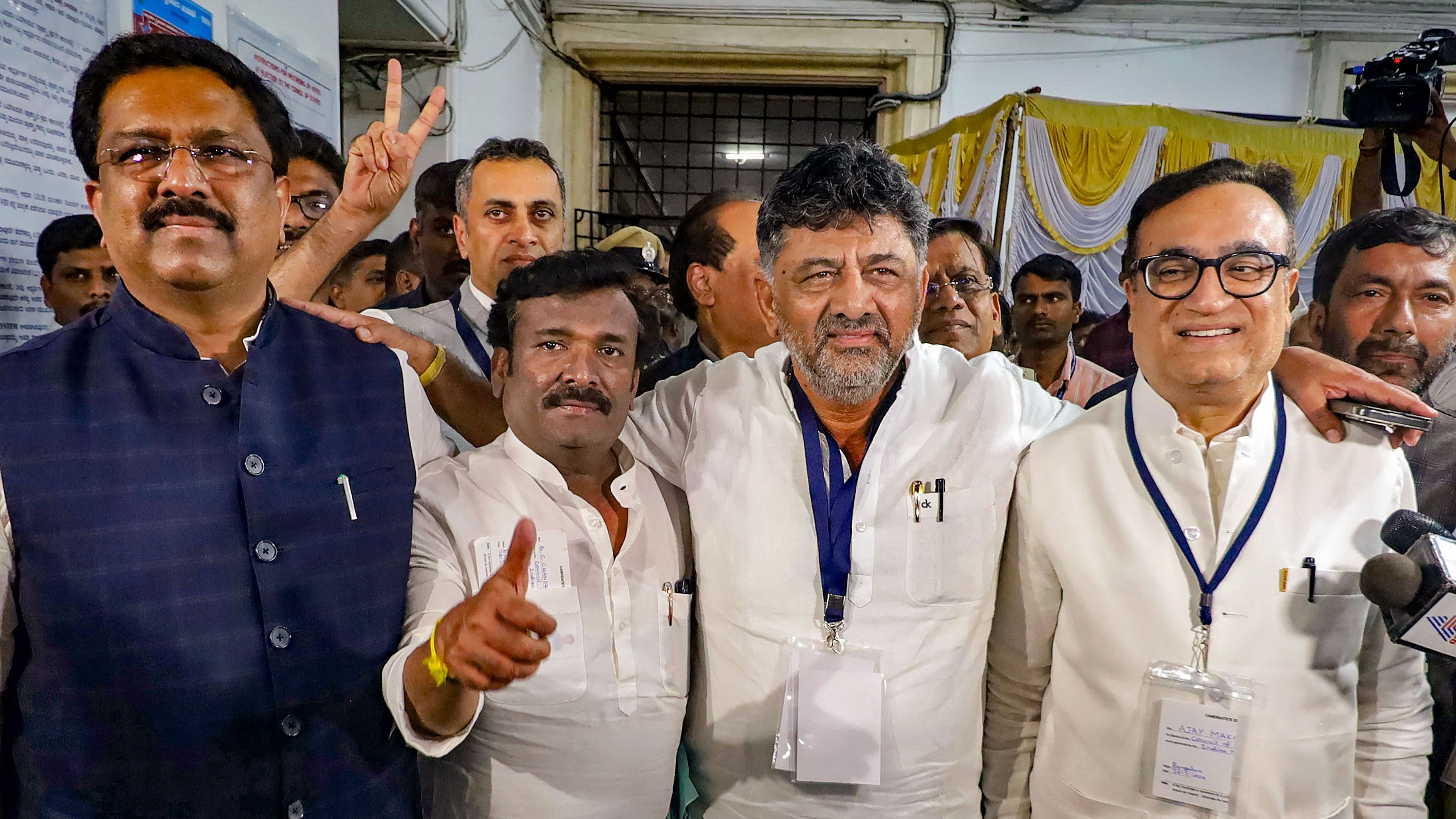 <div class="paragraphs"><p>A file photo of Karnataka Deputy Chief Minister D K Shivakumar with newly-elected Congress Rajya Sabha MPs Syed Naseer (in blue shirt) Hussain,  GC Chandrashekar, Ajay Makhan and others, at Vidhana Soudha in Bengaluru on February 27, 2024. </p></div>