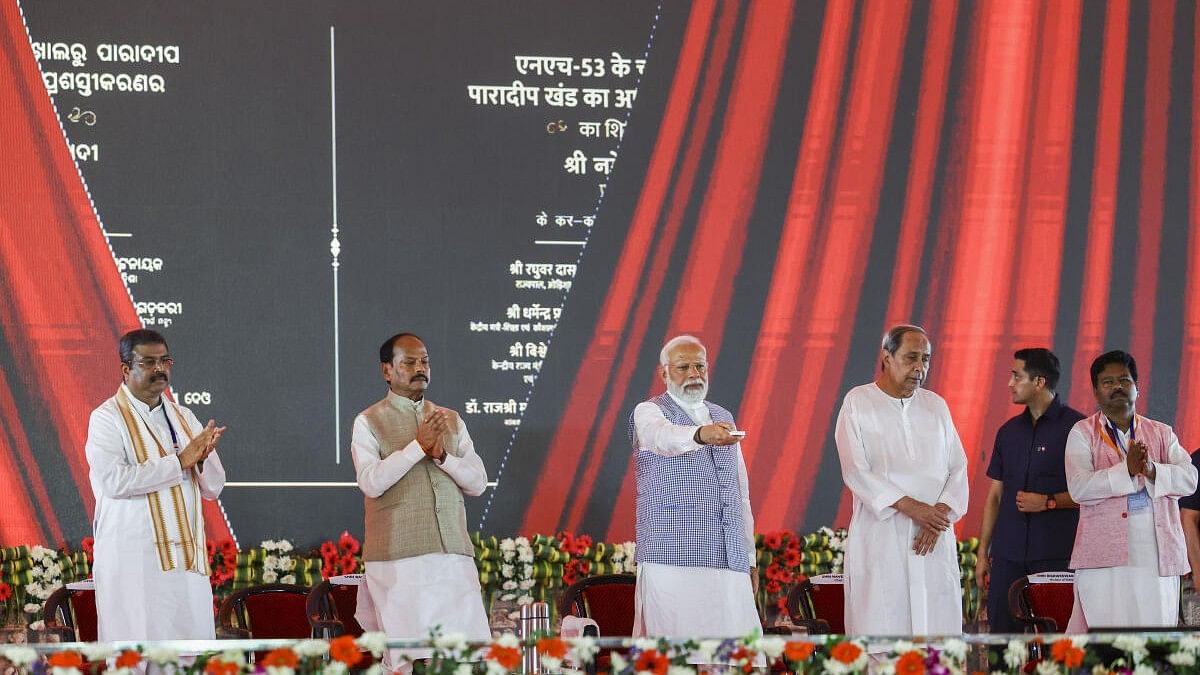 <div class="paragraphs"><p>Prime Minister Narendra Modi with Odisha Governor Raghubar Das, Chief Minister Naveen Patnaik and Union Minister Dharmendra Pradhan during inauguration and foundation stone laying of various projects at Chandikhol, in Jajpur district, Odisha, Tuesday, March 5, 2024. </p></div>