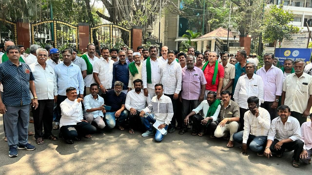 <div class="paragraphs"><p>Farmers gather in front of the BDA head office to oppose plans for the formation of a new layout. </p></div>