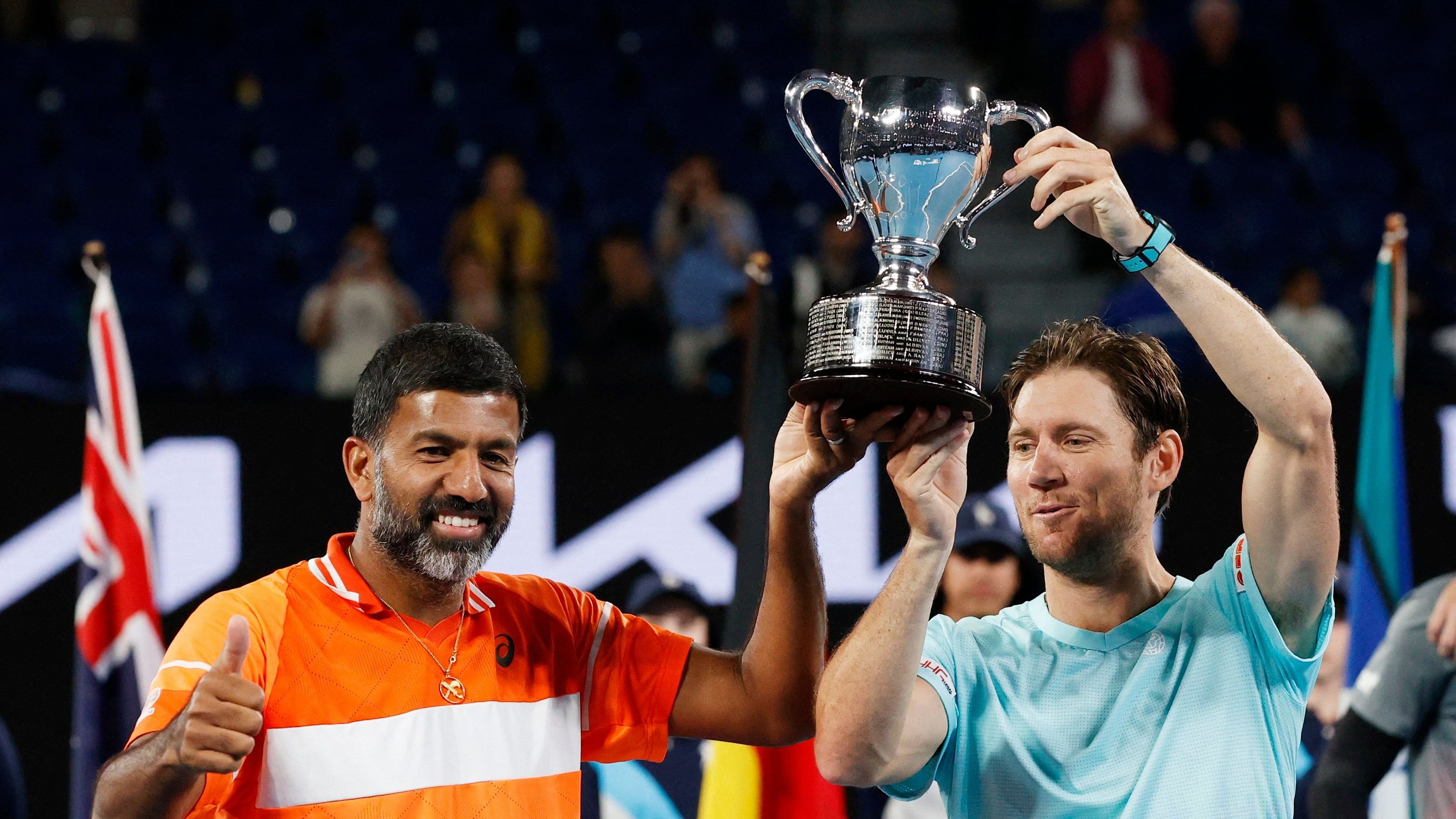 <div class="paragraphs"><p> India's Rohan Bopanna and Australia's Matthew Ebden celebrate with the trophy after winning the men's doubles final against Italy's Simone Bolelli and Andrea Vavassori </p></div>