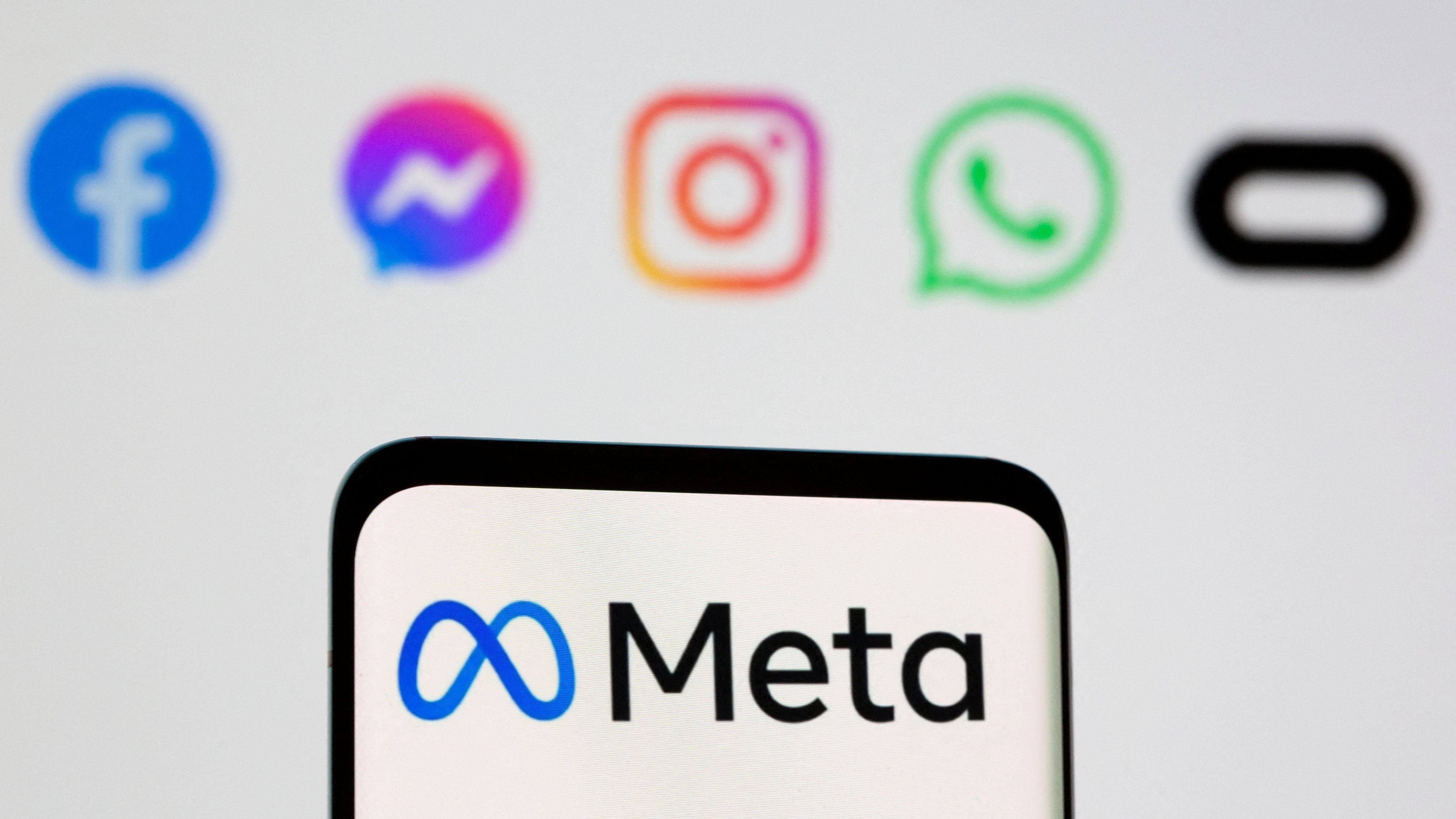 <div class="paragraphs"><p>The Meta logo is seen on smartphone in front of displayed logo of Facebook, Messenger, Instagram, WhatsApp, Oculus in this illustration picture.</p></div>