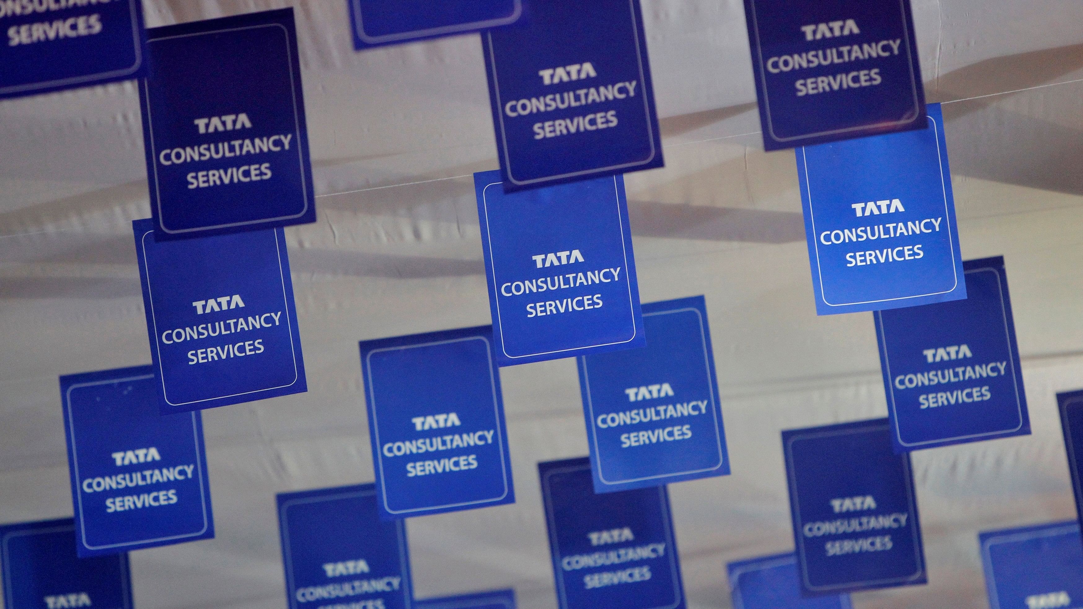 <div class="paragraphs"><p>Logos of Tata Consultancy Services (TCS) are displayed at the venue of the annual general meeting of the software services provider in Mumbai.</p></div>