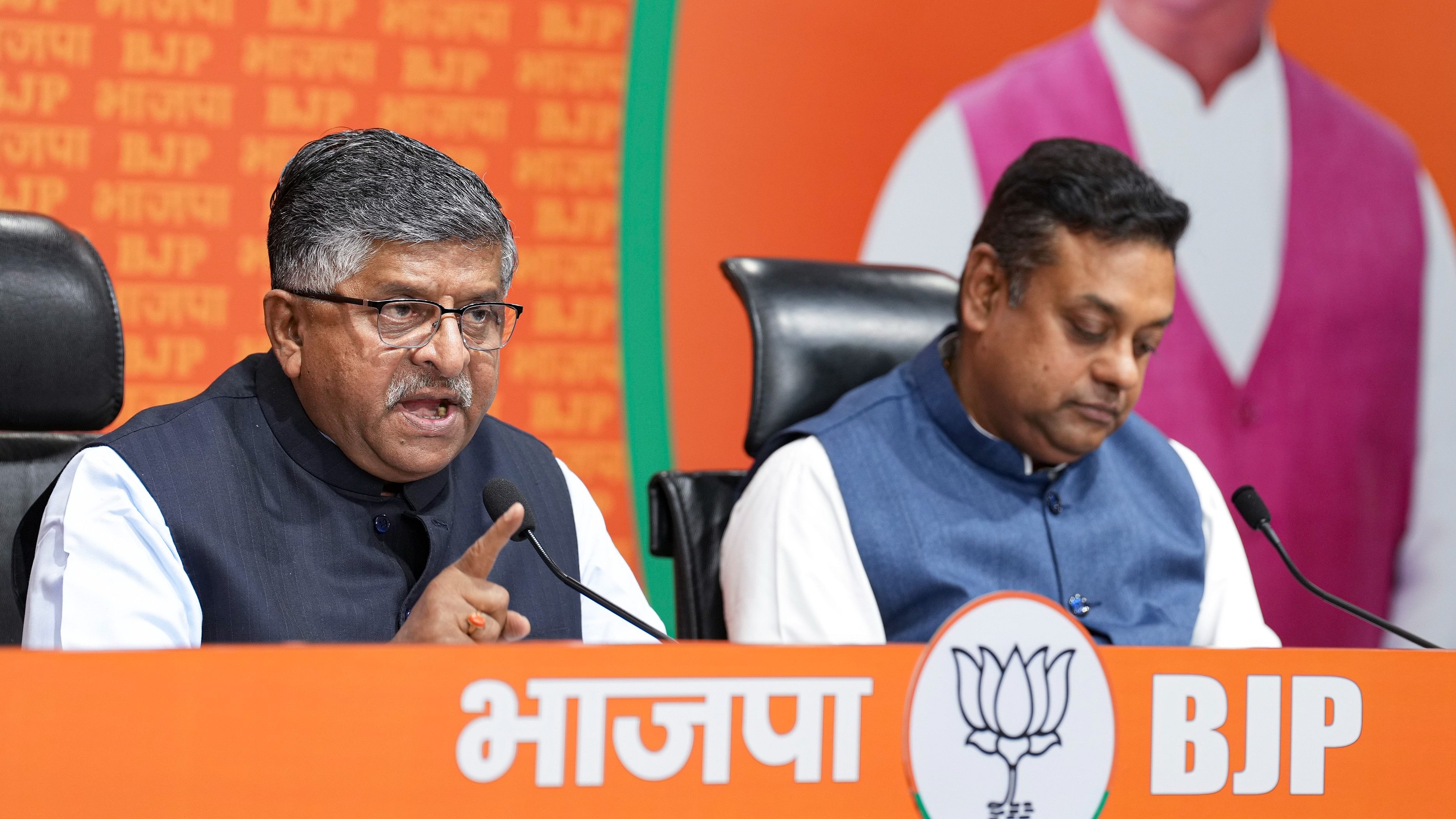 <div class="paragraphs"><p>BJP leaders Ravi Shankar Prasad and Sambit Patra address a press conference at party headquarters, in New Delhi, on Thursday.</p></div>
